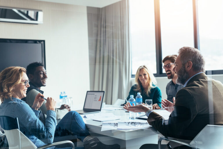 Business people having casual discussion during meeting